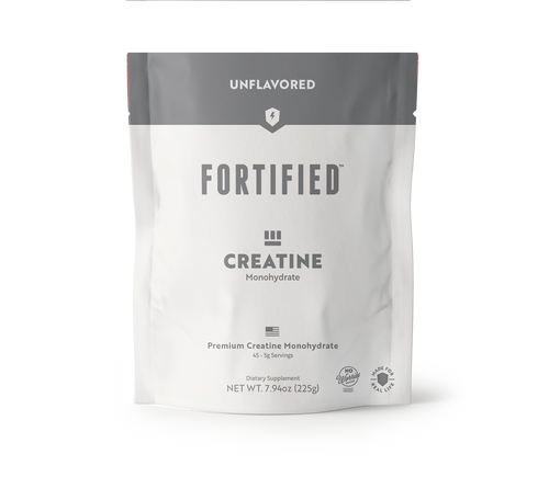 Fortified creatine monohydrate powder package on a white background